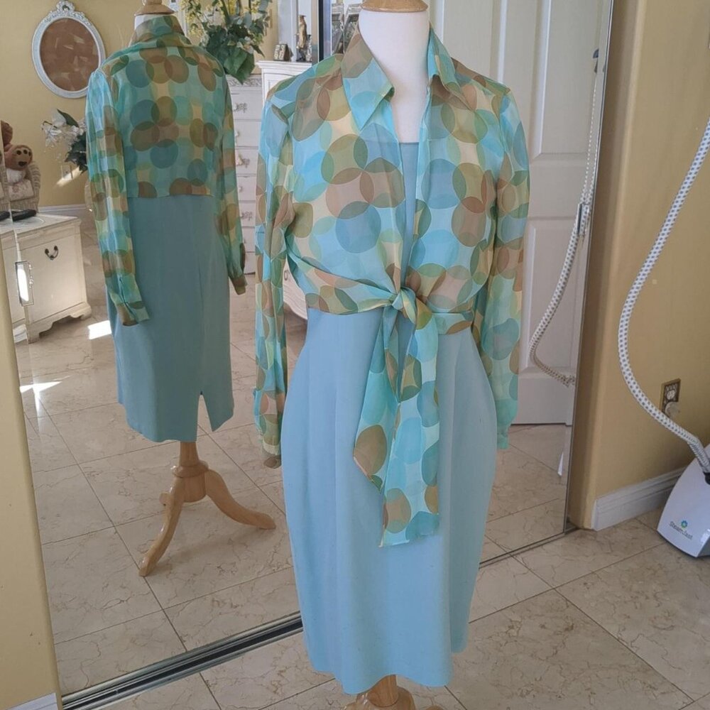 Two piece Maggie London sleeveless dress and cover jacket